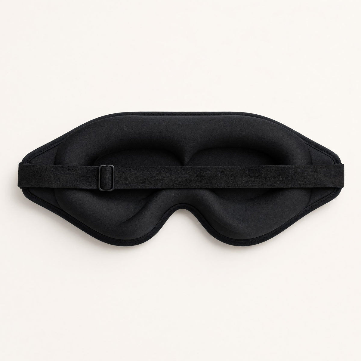 Back of the mask showing the contoured eye cups and adjustable strap